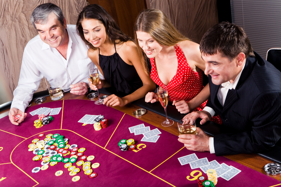 several people are playing casino games 