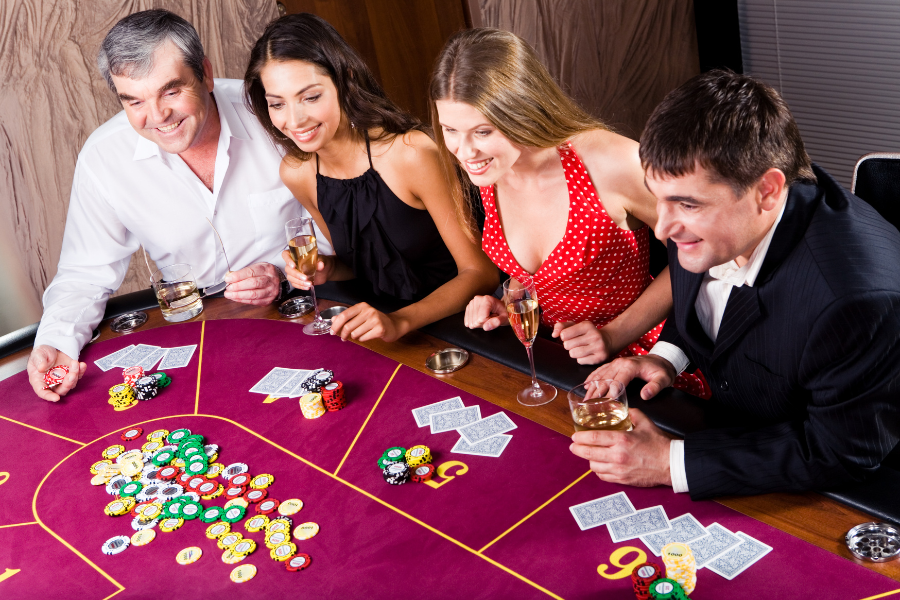 several people are playing casino games